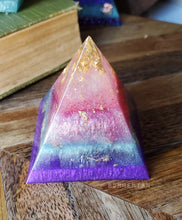 Load image into Gallery viewer, Gold Foiled Pink and Purple Orgonite Pyramid Reiki Resin Crystal Paper Weight Ring Cone