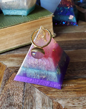 Load image into Gallery viewer, Gold Foiled Pink and Purple Orgonite Pyramid Reiki Resin Crystal Paper Weight Ring Cone